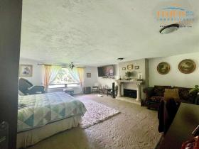 Haus in privater Wohnanlage mit Blick auf den Golfplatz und den See